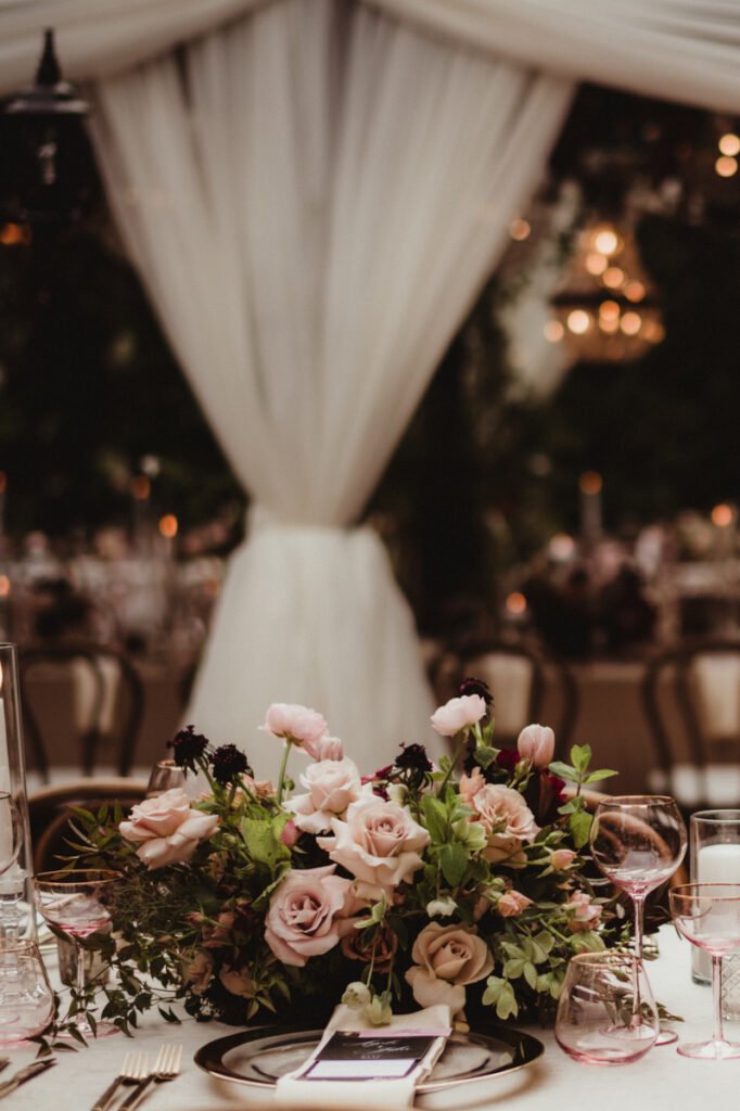 Dusk at an elegant wedding reception outdoors in the garden Opulent wedding package